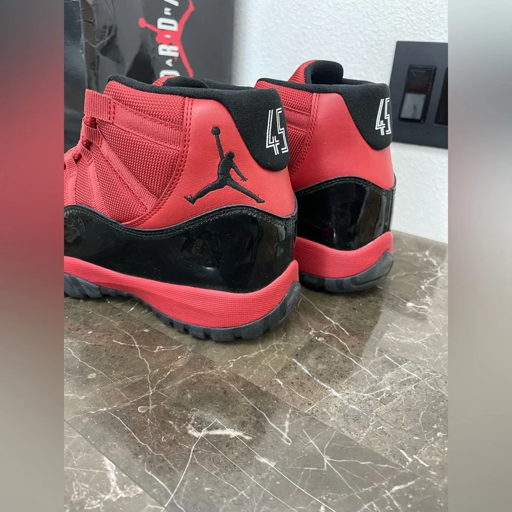 New! Unworn! Air Jordan 11 retro red and black men’s size 8